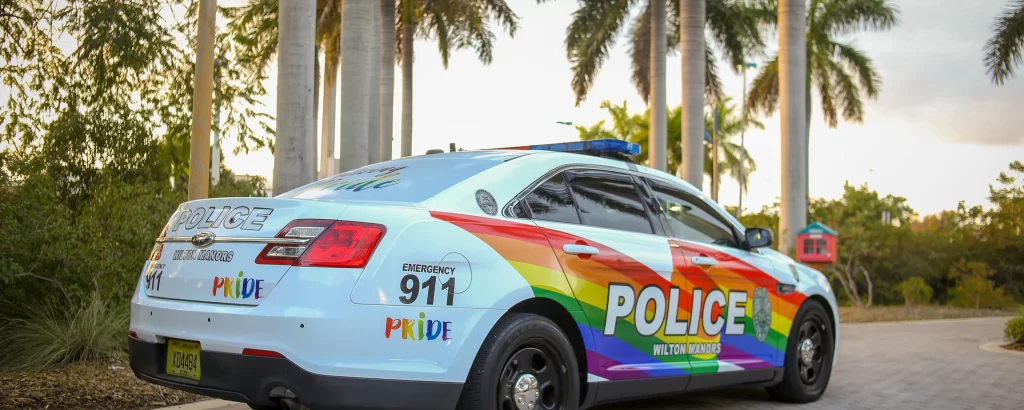 police car with LGBTQ+ colors