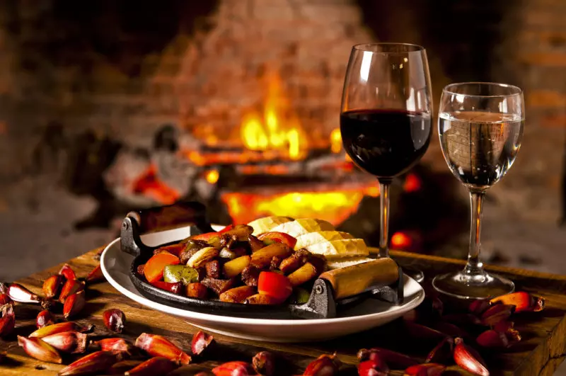 Wine, pine nuts and fireplace