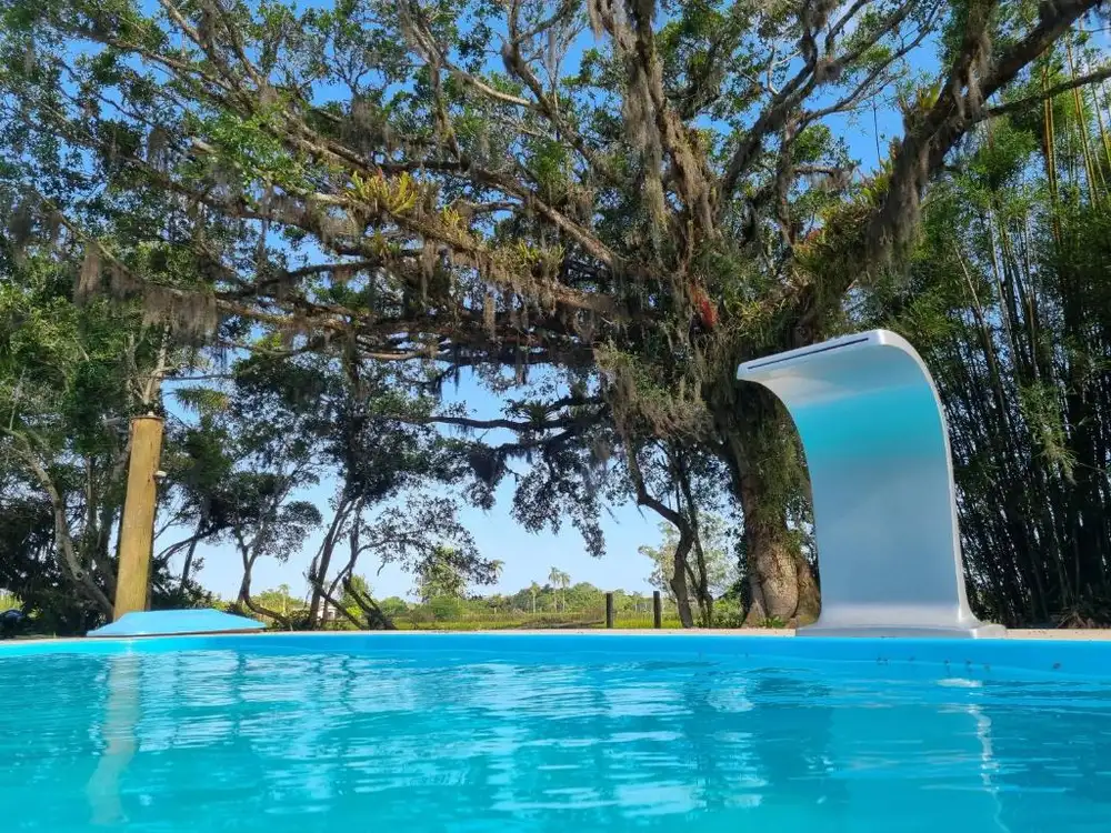 Grundstück mit Schwimmbad, Whirlpool und Zugang zum Fluss Mampituba